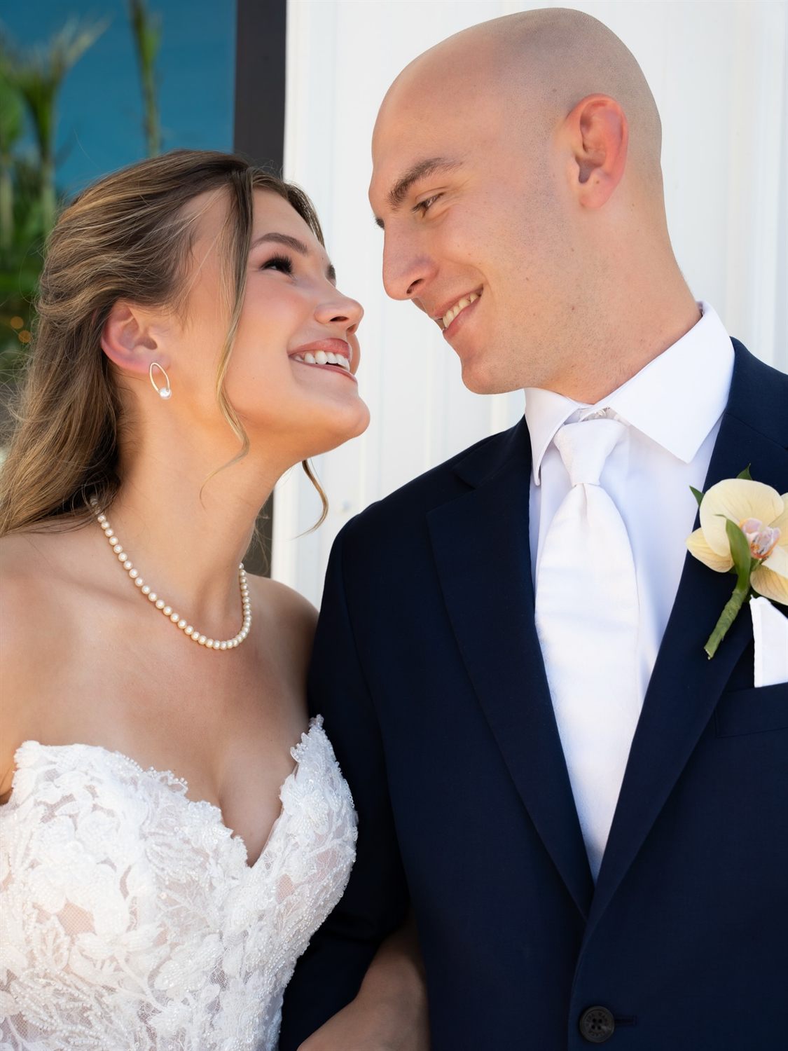 A couple close together on their wedding day